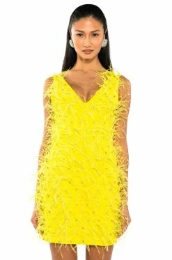 RENDEZVOUS SLEEVELESS FEATHER MINI DRESS IN YELLOW